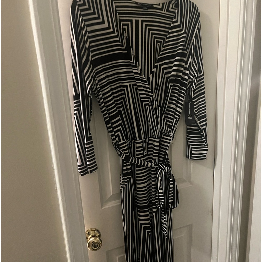 New INC Black and white Jumpsuit with belt.